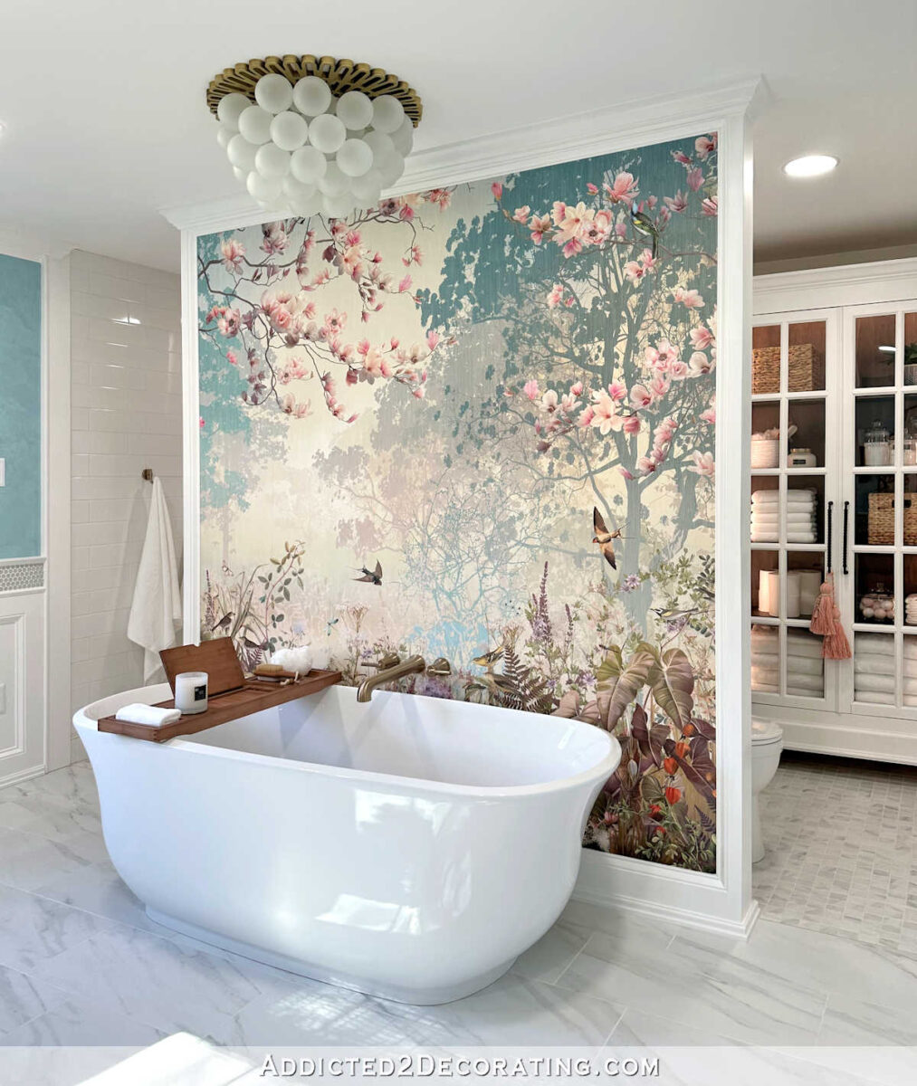 Decorative wallpaper feature in an elegant bathroom